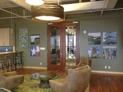 Unique images create comfortable employee lounges. (Jameson Interiors, TX)