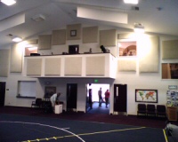Acoustic panels installed in a large multi-purpose room of a church.